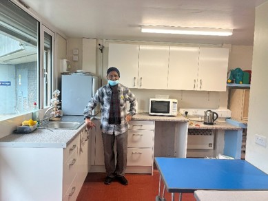 A person standing in a kitchen

AI-generated content may be incorrect., Picture